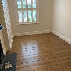 Domestic Victorian pine floorboards, repaired stained and lacquered