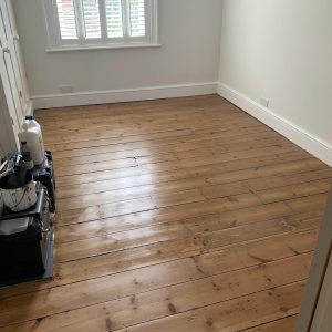 Domestic Victorian pine floorboards, repaired stained and lacquered