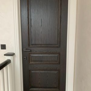 Oak door stained off black matt lacquered